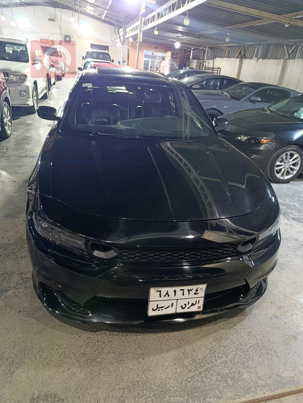 دۆج چارجەر